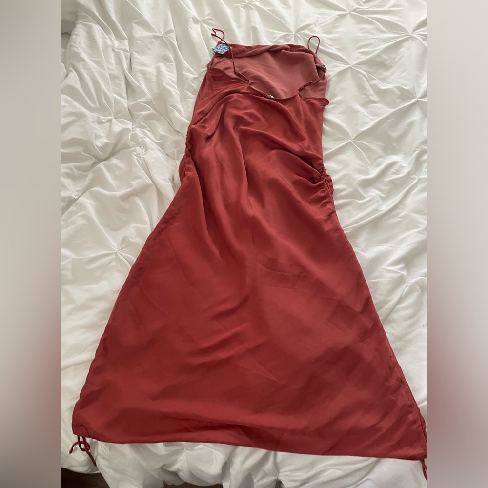 Free people new with tags dress never worn adjustable length.